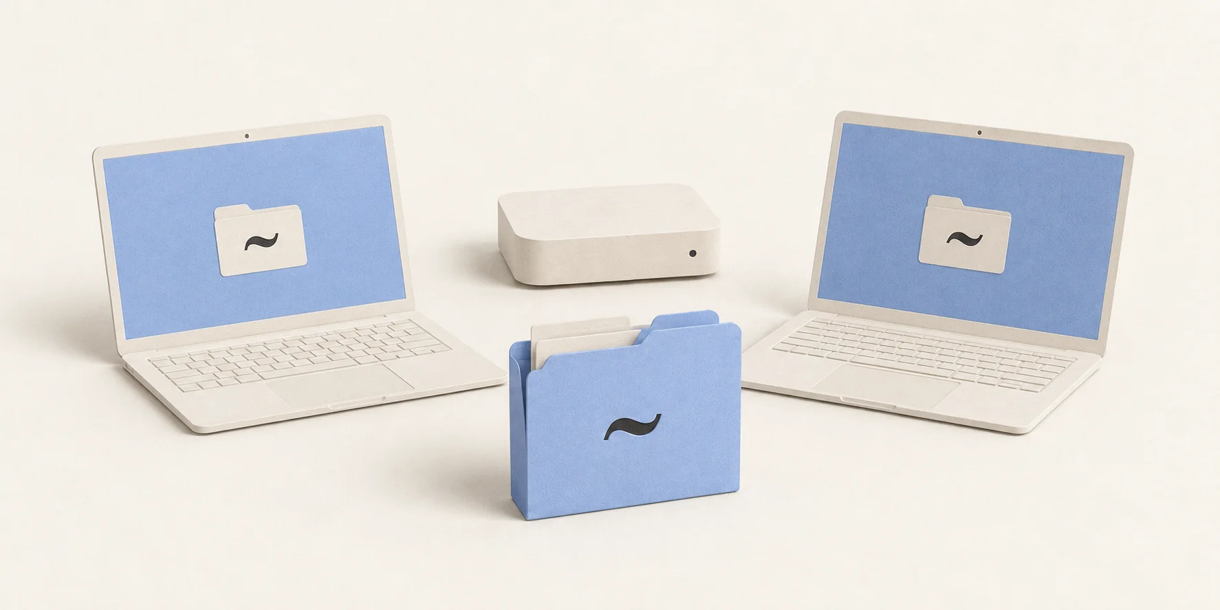 Two laptops and a Mac mini sharing the same Tilde folder.